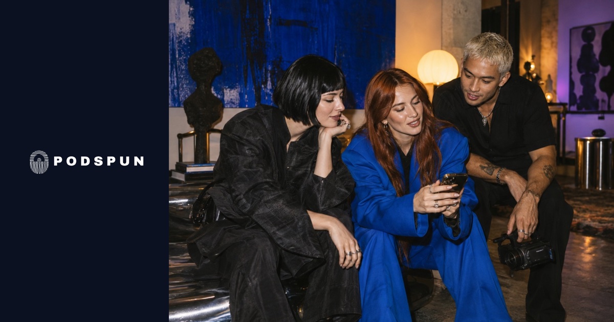 The Podspun logo beside a photograph of three creators looking at a phone in a gallery